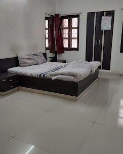 Double bed room at Kadva Patel Samaj Nathdwara Rajasthan